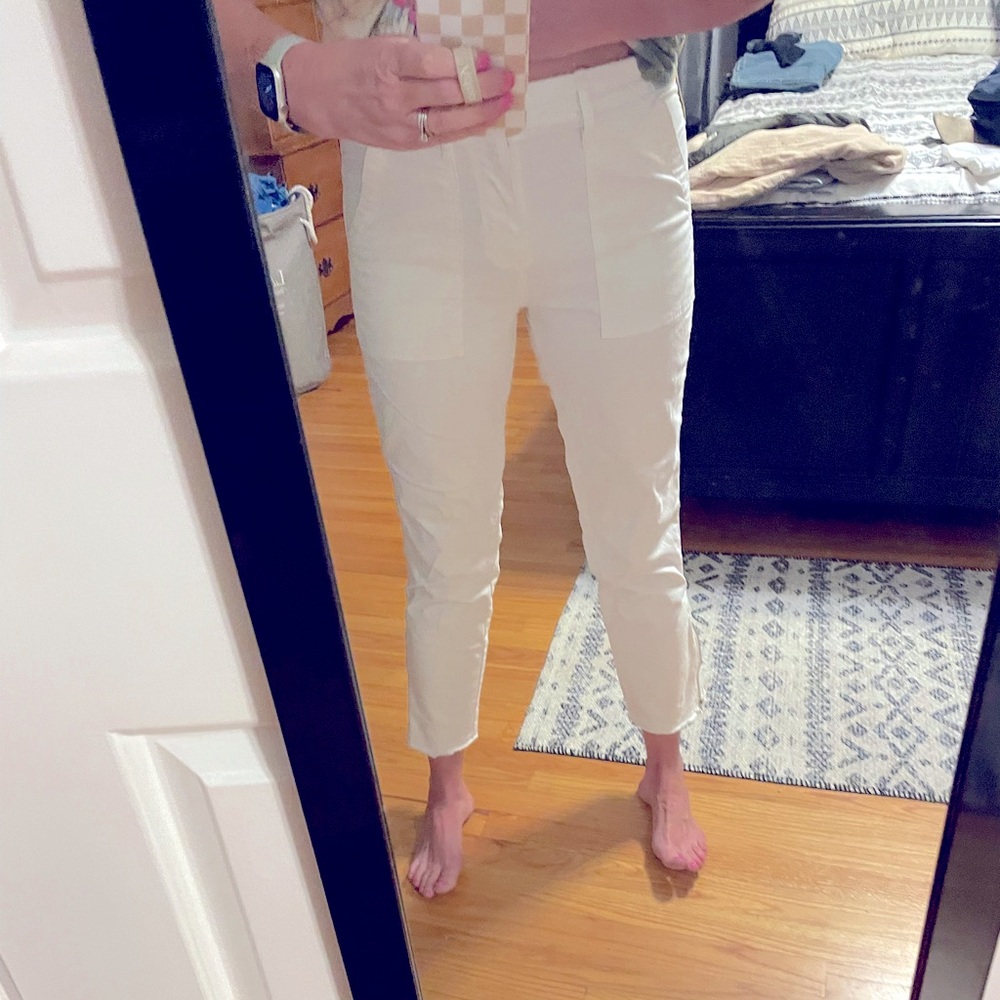 Sanctuary white pant with zipper bottoms.